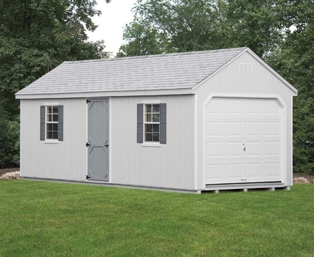 grey 7 cape amish built garage in backyard