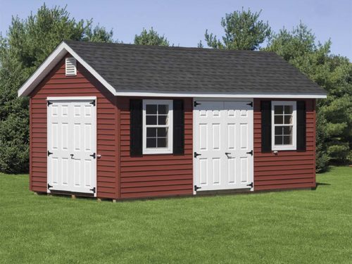 maroon classic cottage shed with white doors and asphalt shingles