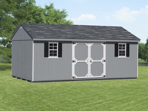 grey cottage shed sitting on lawn