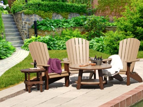 outdoor furniture sitting in front of pool