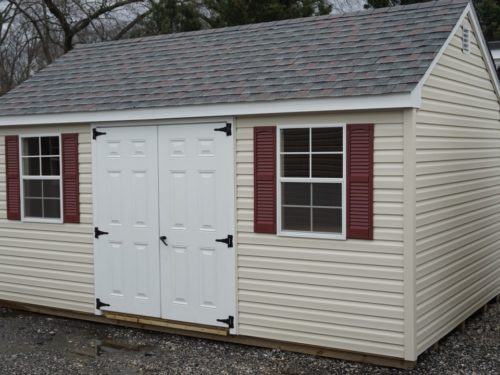 tan cape shed with tan doors