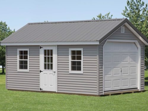 classic cottage garage with white doors and windows