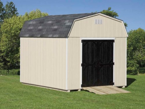 tan dutch barn shed with black doors