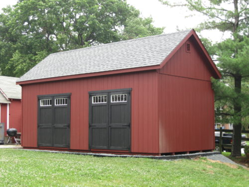 maroon custom classic cottage shed with double black doors