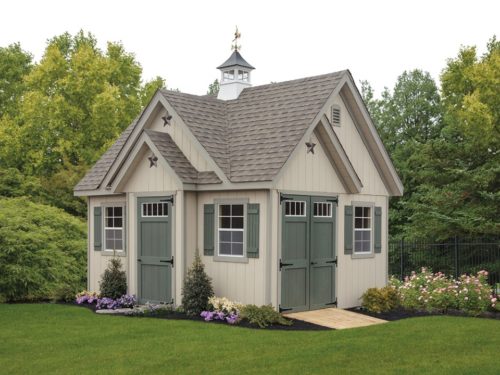 alpine shed with green doors