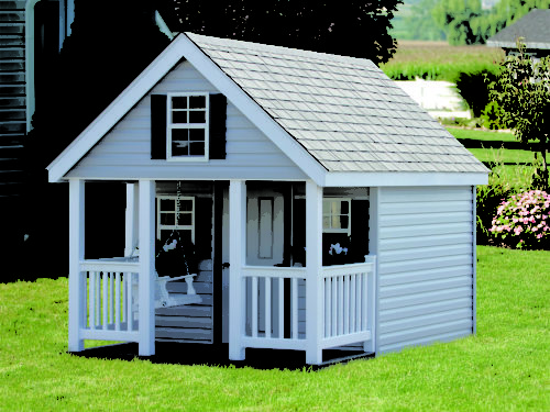 elite playhouse sitting in backyard
