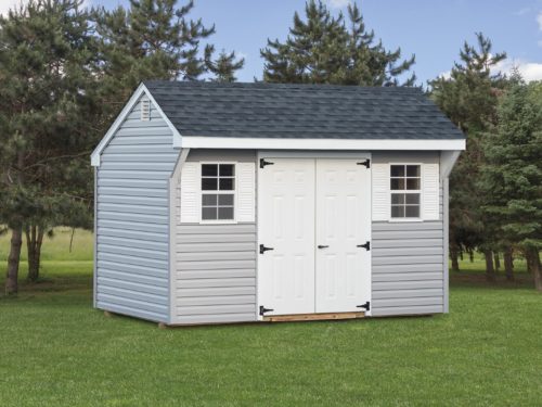 quaker shed with white door in backyard