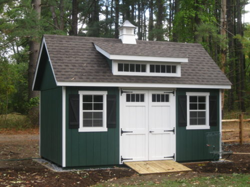 dark green custom classic cottage shed