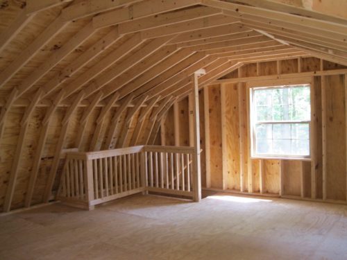 interior of second floor of two story dutch barn shed