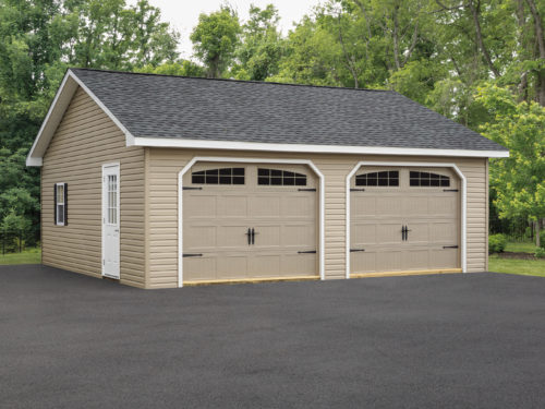tan two car garage with tan garage door and white side door