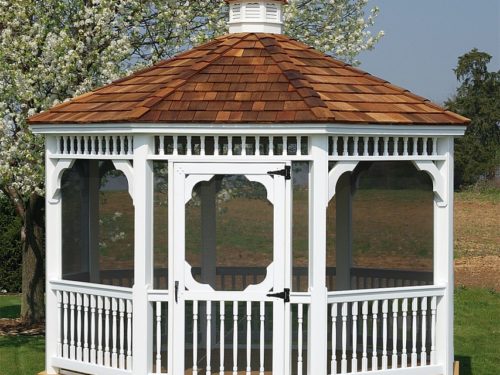vinyl gazebo sitting in front of field