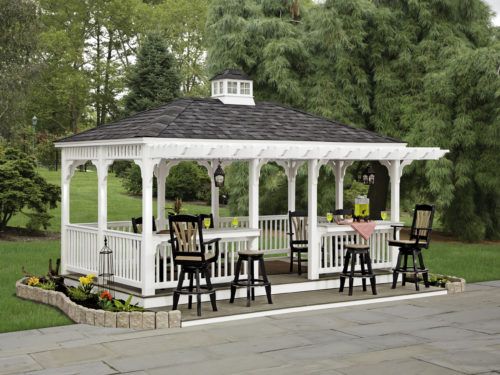 vinyl gazebo next to backyard patio